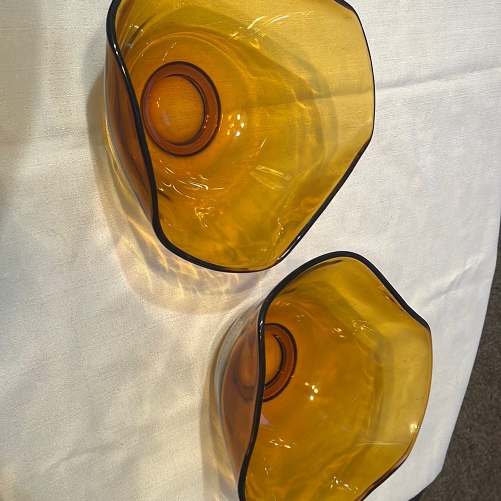 Two amber glass bowls